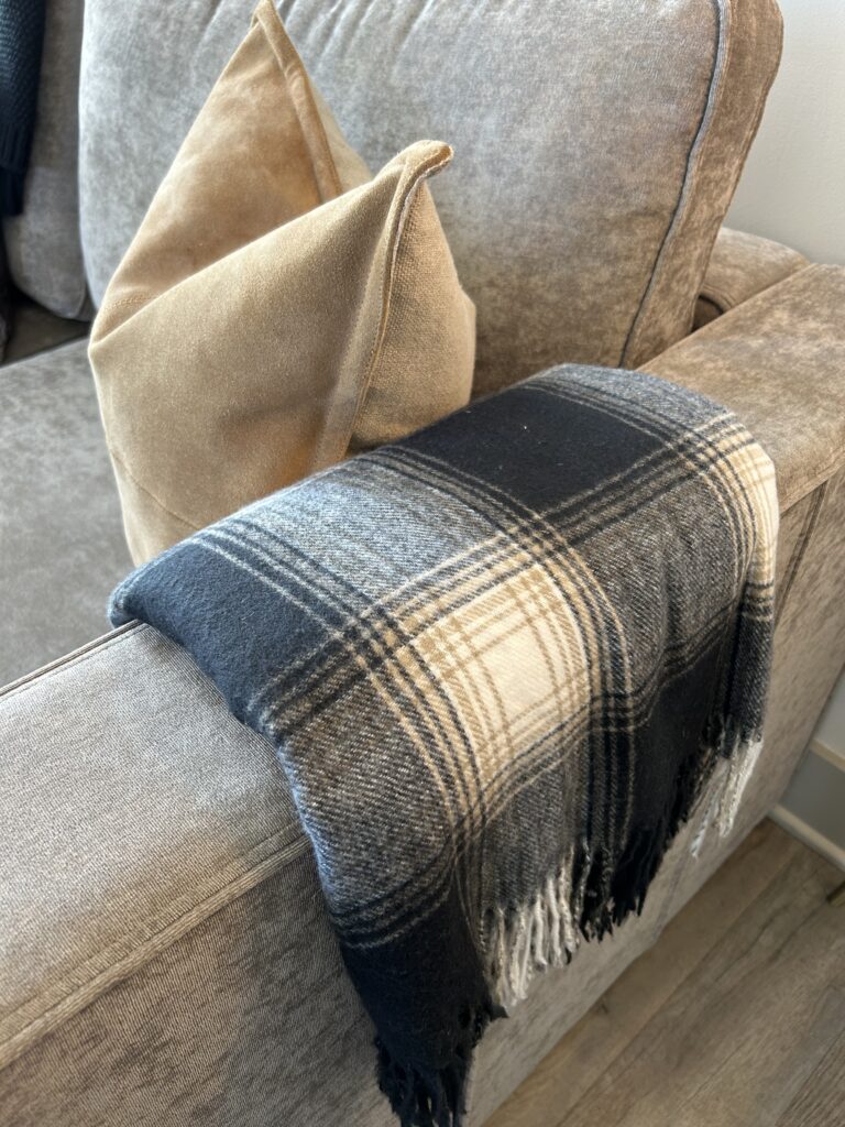 fall blanket on arm of sofa