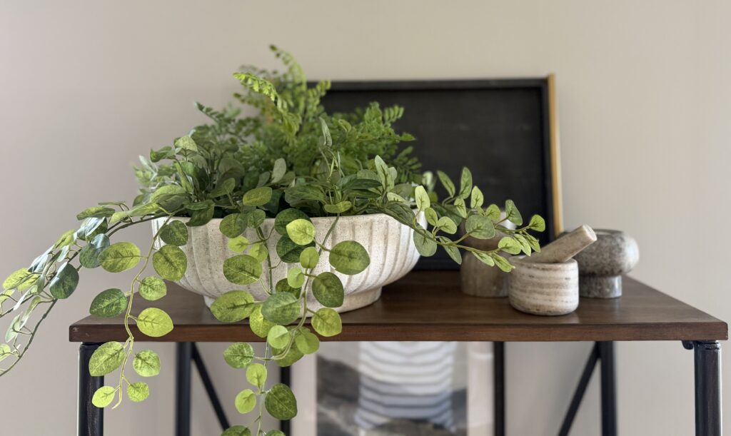 greenery on a tall shelf