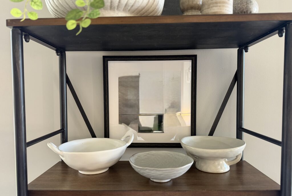 three bowls on a shelf